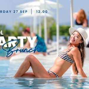 Woman in bikini relaxing in pool during stylish brunch party under the sun, September 2025.