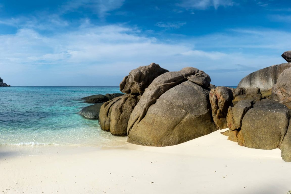 Paradise beach between rocks on Similan islands, Thailand