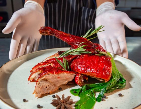 chef-serving-roast-duck-phuket-resort