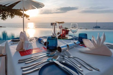 kata-rocks-festive-dining-table-sunset-view