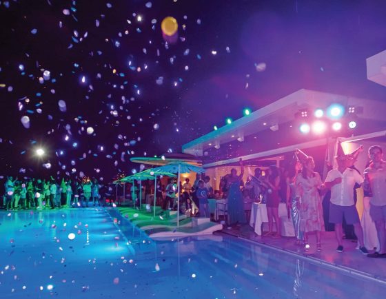 Midnight countdown celebration by the pool at Kata Rocks New Year’s Eve Gala, luxury resort in Phuket