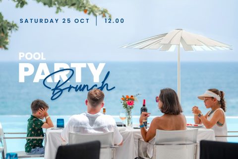 Family enjoying poolside brunch with ocean view at a beach resort, October 2025.