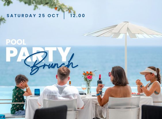 Family enjoying poolside brunch with ocean view at a beach resort, October 2025.